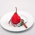 Pera al vino, gelato di ricotta e fava tocca